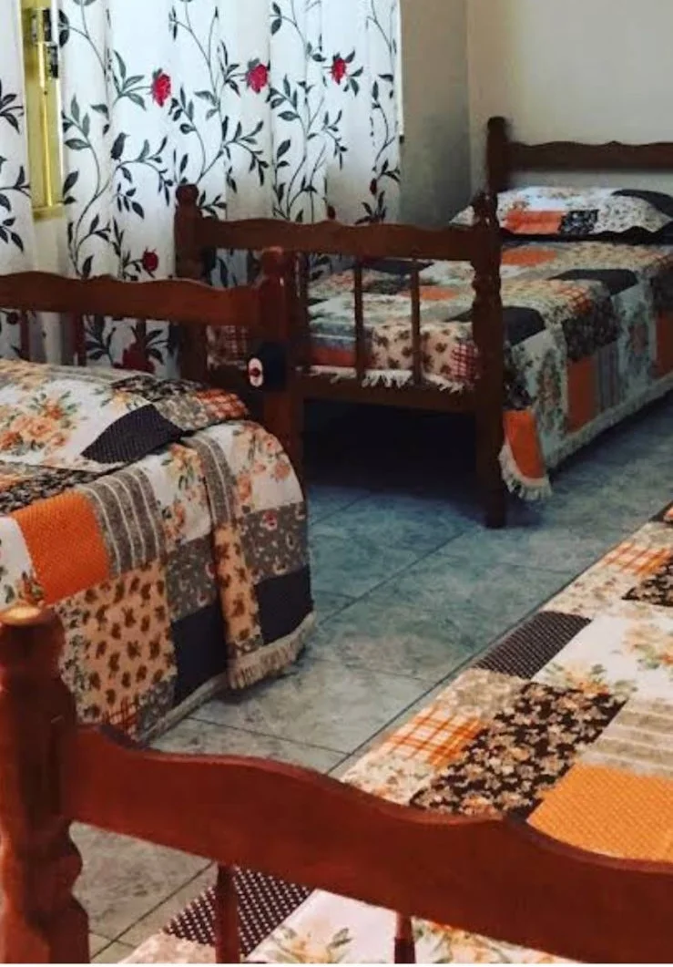 Quartos organizados e confortáveis